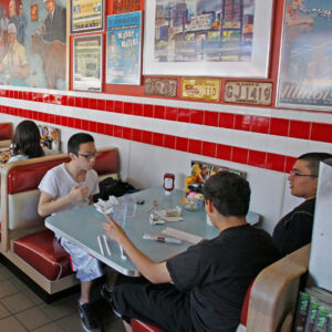 men talking at diner